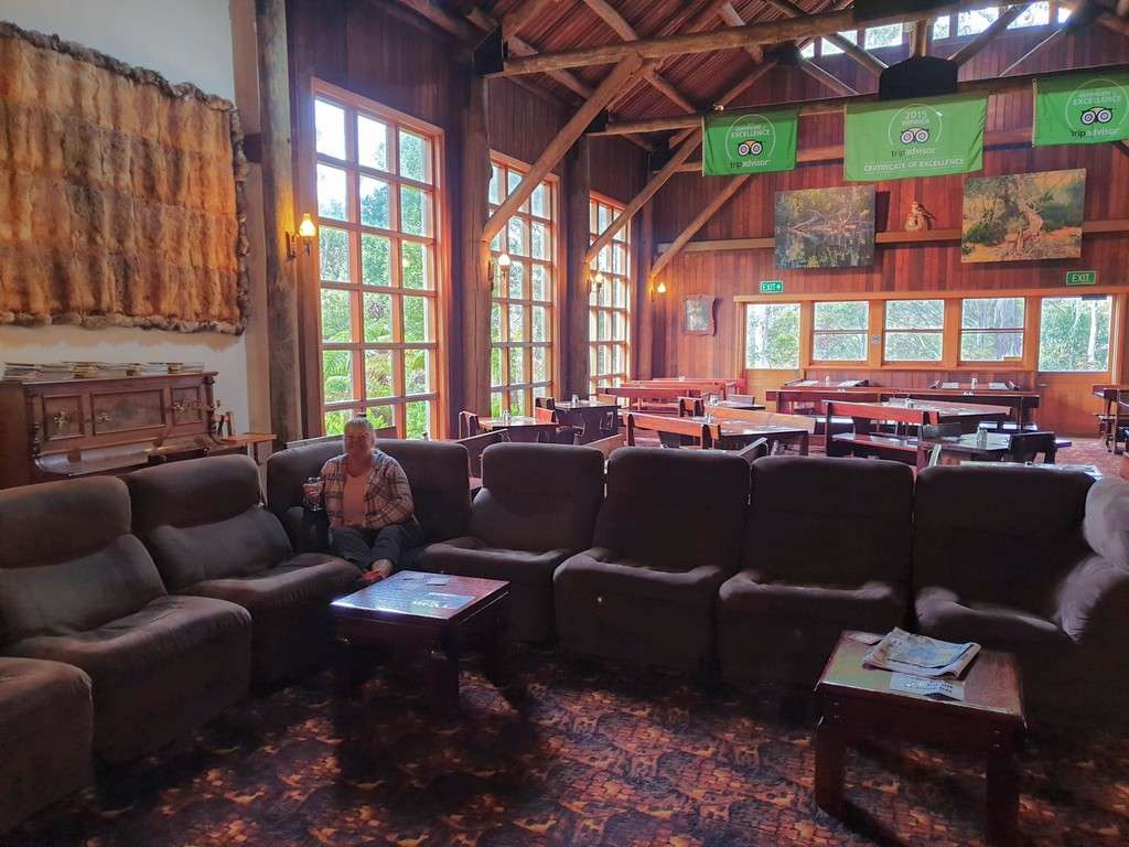  Derwent bridge wilderness hotel seating lounge area by fireplace 