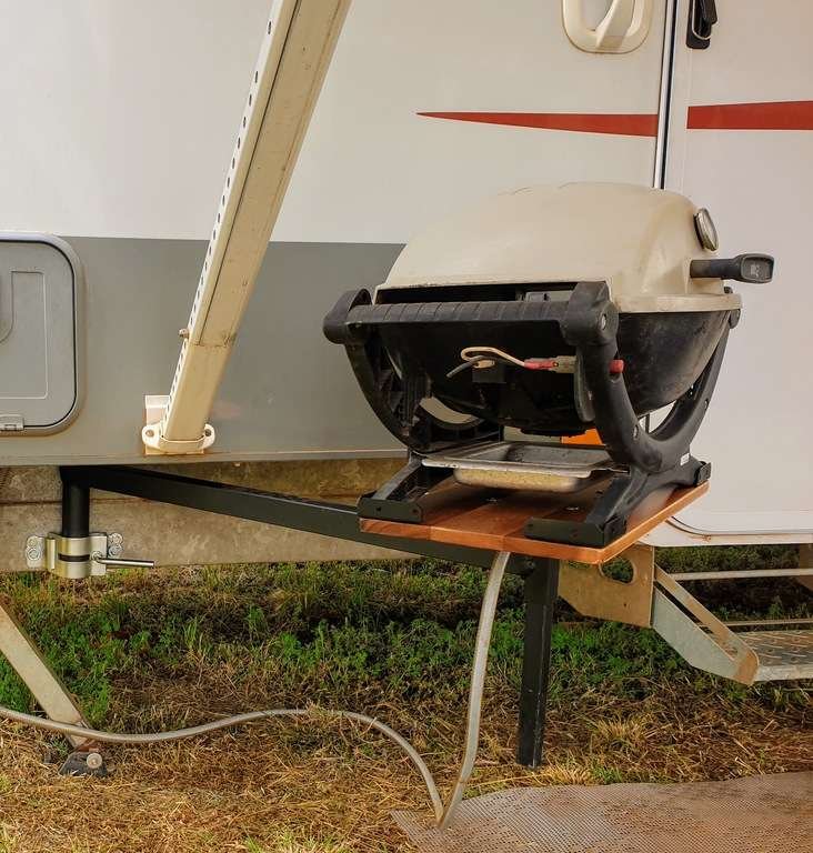 Caravan BBQ swing arm with Weber baby Q