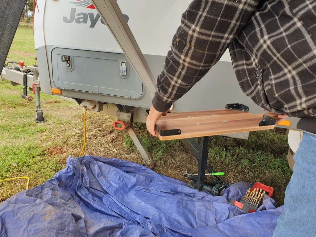  bbq swing arm inserting table on caravan 