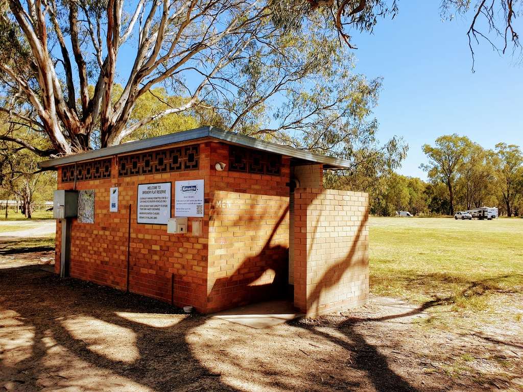 sign and toilets at Fire Pit at Narrandera Brewery Flat Reserve Free Camp NSW