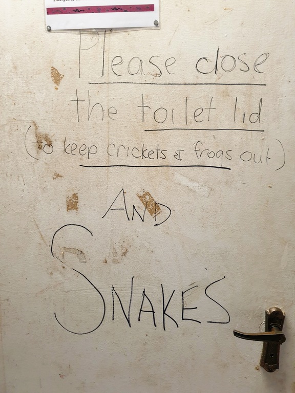 warning in the bush toilet pub NSW